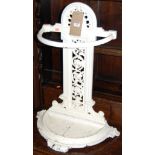 A Victorian cast iron demi-lune stick stand, having pierced floral decorated back plate, height 71.