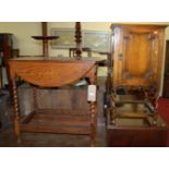 A 1920s oak barley twist drop-flap occasional table, having single end drawer, together with a