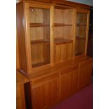 Benny Linden Design - a contemporary teak wall unit, with twin glazed upper doors, w.169cm