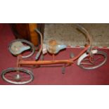 A mid-20th century Triang painted metal child's tandem bicycle, length 140cm