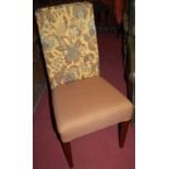 A set of five contemporary mahogany framed upholstered and studded dining chairs