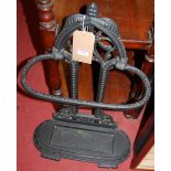 A Victorian style black painted cast iron stick stand