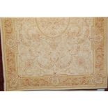 A contemporary Laura Ashley cream ground rug in the Persian taste, 190 x 137cm