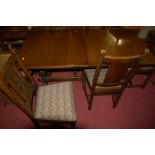 A contemporary Old Charm oak dining suite, comprising; extending dining table with pull-out action