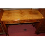 A reproduction yew wood two drawer side table, width 106.5cm