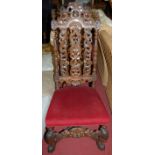 A Carolean style carved walnut high back single dining chair, having upholstered stuff over seat,