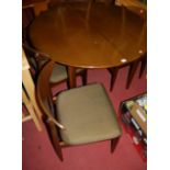 A 1960s English stained teak dining suite, comprising; D-end dining table with pull-out action and