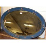 A Japanned blue lacquered and bevelled oval wall mirror, width 67cm