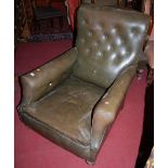 A late Victorian walnut framed and green hide upholstered open armchair raised on turned forelegs,