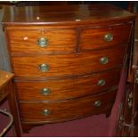 An early 19th century mahogany bow front chest of two short over three long drawers, width 103cm