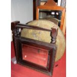 A glass Benares topped occasional table on folding base, Edwardian walnut wall mirror, moulded oak