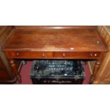 A mid-Victorian mahogany round cornered and three-quarter gallery backed two drawer side table,