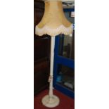 A cream painted standard lamp, having a reeded and acanthus leaf carved column with shade, overall