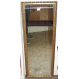 A contemporary floral gilt framed rectangular wall mirror, 97 x 36cm