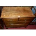 An Edwardian faded walnut low chest of two short over two long drawers, width 92cm