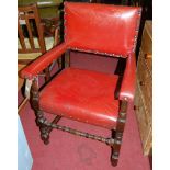 A set of six early 20th century oak framed red leather upholstered and further studded dining chairs