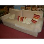 A large contemporary upholstered four-seater sofa, with scatter cushions, w.225cm