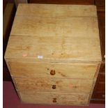 A 19th century rustic pine low chest of three drawers, width 67cm