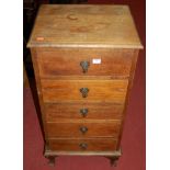 An early 20th century oak narrow chest of five drawers, width 48cm