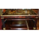 A contemporary hardwood, brass bound and glass inset rectangular low coffee table, decorated with