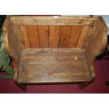 A contemporary stained pine panelled back single seat church pew, width 80cm