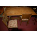 A contemporary moulded oak dining suite, comprising trestle end dining table, length 152cm, and a