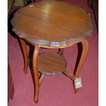 An Edwardian walnut and oak piecrust topped two-tier occasional table, dia. 60cm