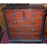 A mid-Victorian mahogany round cornered chest of two short over three long drawers (with losses