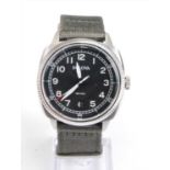 A gents Bulova Military brushed steel ultra high frequency 262khz quartz wristwatch, having round