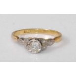 An 18ct gold and platinum diamond solitaire ring, the illusion set old round cut diamond weighing