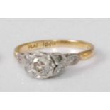 An 18ct gold and platinum diamond solitaire ring, the illusion set old brilliant weighing approx 0.