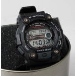 A gent's Casio G-Shock digital wristwatch, in presentation tin, outer card box, and with various