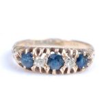 An Edwardian 18ct yellow gold, sapphire and diamond five stone half hoop eternity ring, featuring
