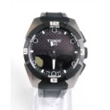 A Gents Tissot Touch Solar Smart titanium wristwatch, having round purple baton dial with digital