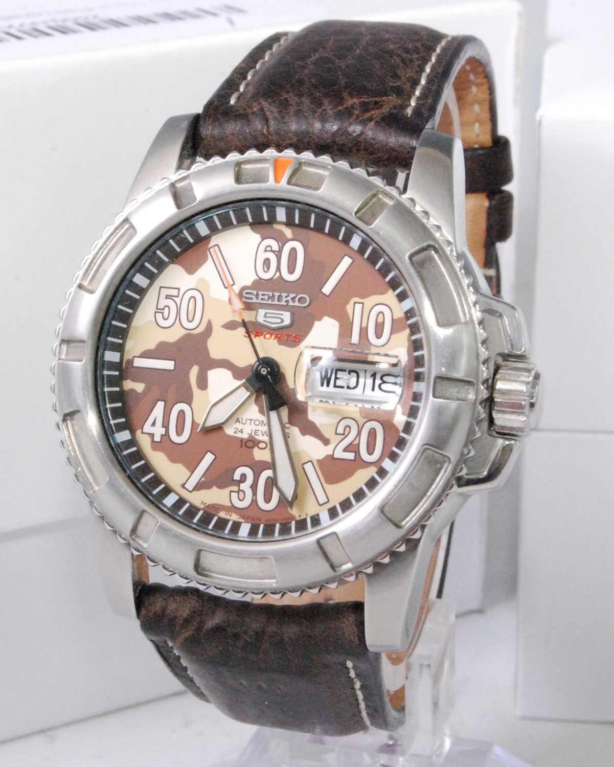 A gent's Seiko 5 Sports steel cased automatic wristwatch, having a camouflage dial, day-date