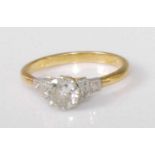 An 18ct gold diamond solitaire ring, the claw set round cut diamond weighing approx 0.75 carat,