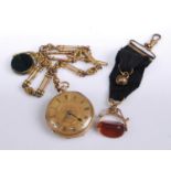 An Edwardian 18ct gold cased open face pocket watch, having an engraved and gilded dial with Roman
