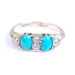 A late Victorian 18ct yellow gold, turquoise and diamond dress ring, featuring two oval turquoise