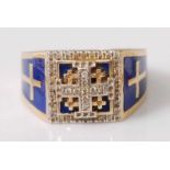 A gents yellow metal heavy square shaped signet ring, featuring a centre cross section set with nine