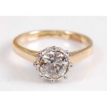 A yellow and white metal diamond single stone ring, featuring an Old European cut diamond in an