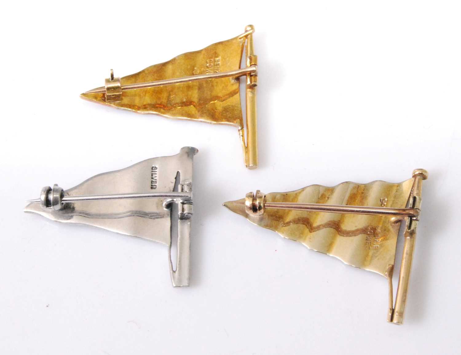 A 9ct gold and polychrome enamel nautical pennant brooch, retailed by Benzie, Cowes, 31mm; - Image 2 of 2