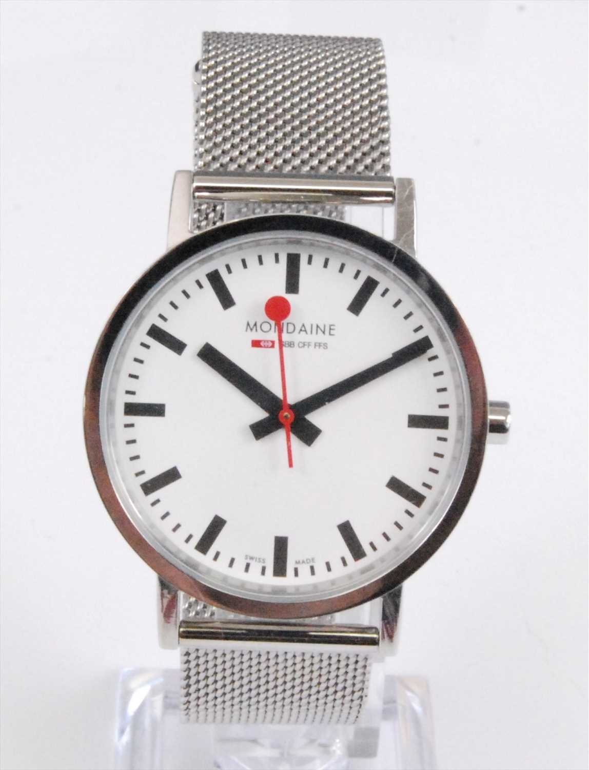 A Gents stainless steel Mondaine Classic quartz wristwatch, having round white baton dial, fitted to