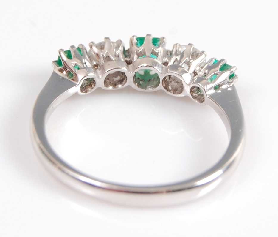 A white metal, emerald and diamond five stone half hoop eternity ring, featuring three graduated - Image 4 of 6