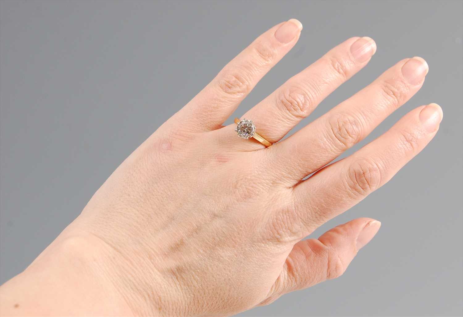 A yellow and white metal diamond single stone ring, featuring an Old European cut diamond in an - Image 5 of 5