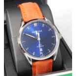 A gent's Tina steel cased DS-2 Precidrive quartz wristwatch, having signed blue dial, baton markers,