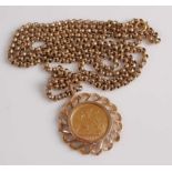 A yellow metal round belcher link guard chain with a Victorian half sovereign in pendant mount,