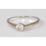 A contemporary 18ct white gold diamond solitaire ring, the claw set brilliant weighing approx 0.33