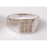 A 9ct white gold square signet ring, the head set with nine single cut white stones (untested due to