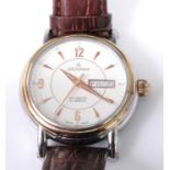A Grovana gent's steel and gilt plated automatic wristwatch, having a signed white dial with day-