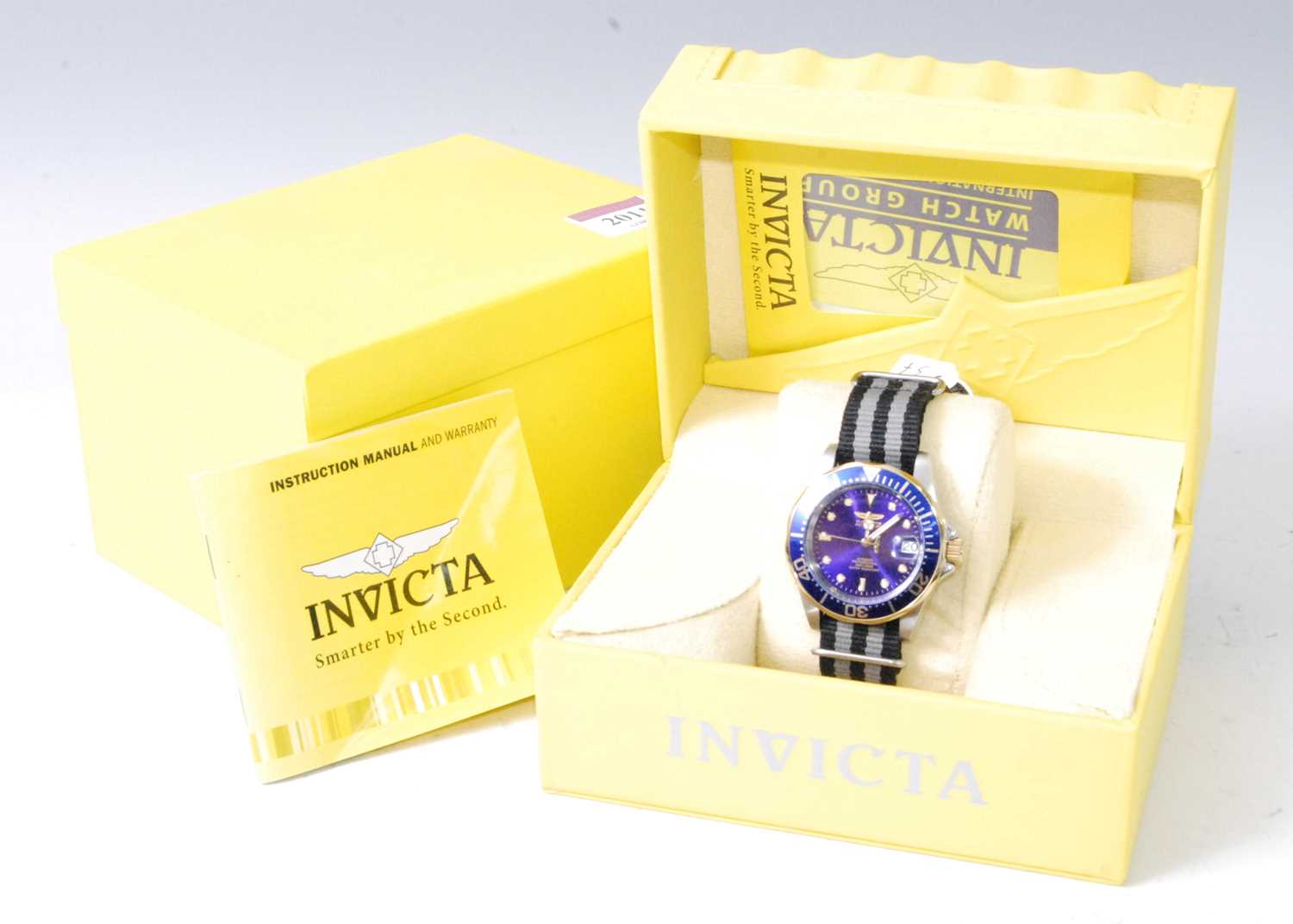 A gent's Invicta steel cased automatic wristwatch, having fixed blue bezel, signed blue dial, - Image 2 of 3